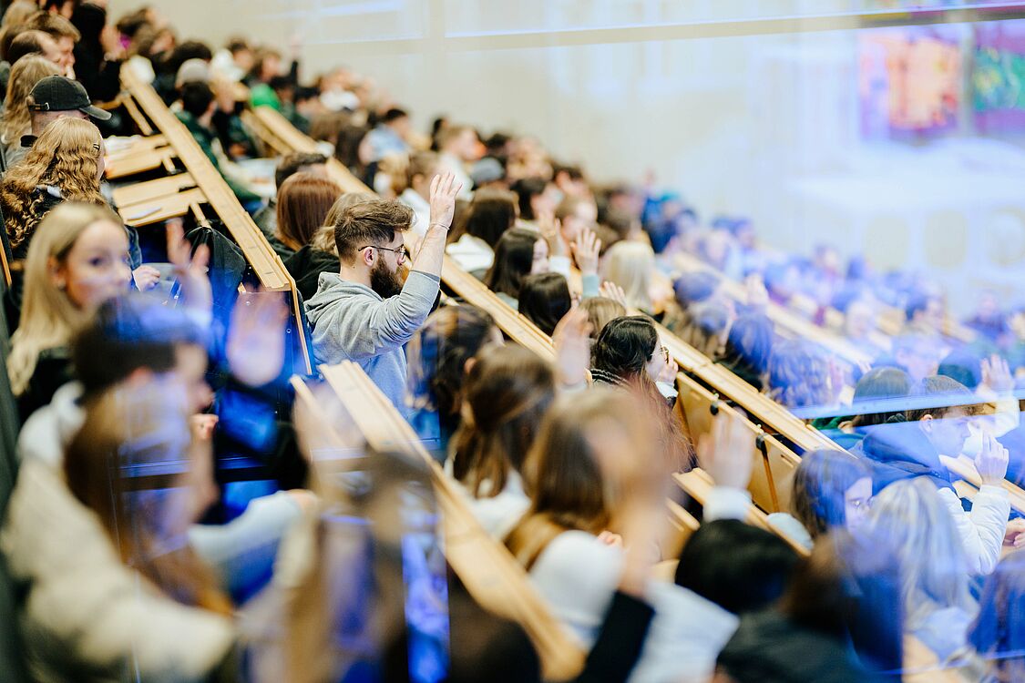 Students sitting in the lecture hall, typical lecture situation.